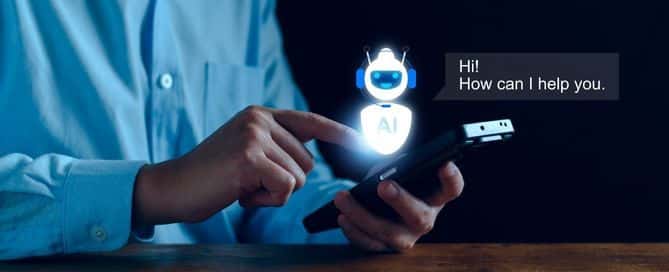 A imagem mostra um homem mexendo em um celular. Logo acima da tela há um holograma de um robô com a sigla AI escrito em seu corpo. Ao lado há dois balões de fala nos quais o robô diz "oi" e pergunta como pode ajudar o usuário.
